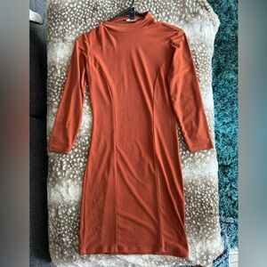 It’s giving Velma midi vintage style dress